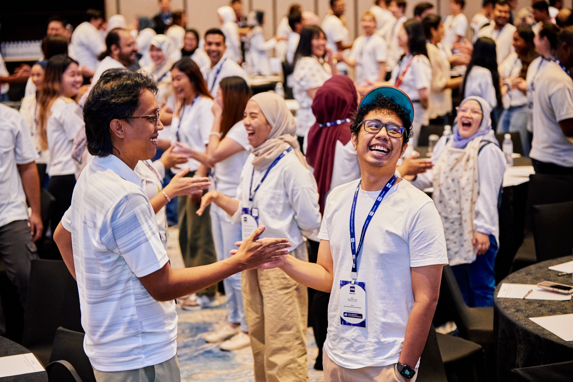 Participants engaging in a live training activity during Wesley Chan's workshop